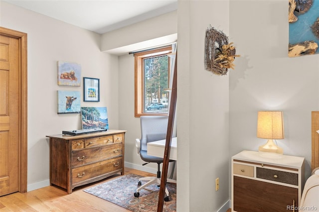 office area featuring light hardwood / wood-style floors