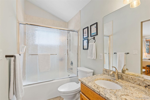 full bathroom with vaulted ceiling, toilet, vanity, and bath / shower combo with glass door