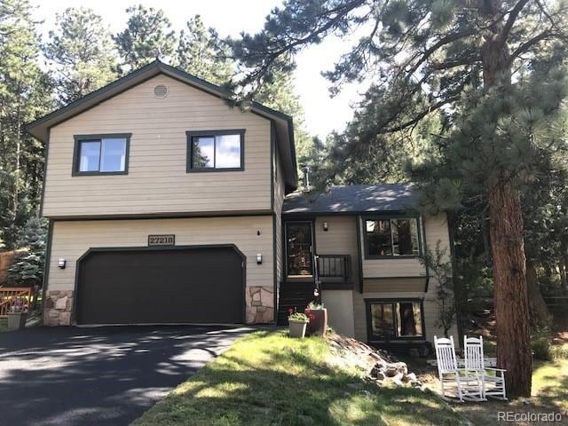 view of front of home featuring a garage