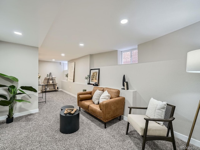 living room with recessed lighting, baseboards, and carpet floors