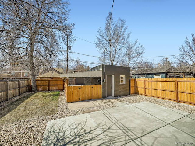 exterior space with a fenced backyard