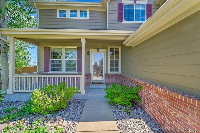 16500 Hitching Post Cir, Parker, CO 80134 - view of exterior entry featuring a porch