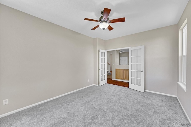 16500 Hitching Post Cir, Parker, CO 80134 - unfurnished bedroom featuring french doors, carpet floors, a ceiling fan, and multiple windows