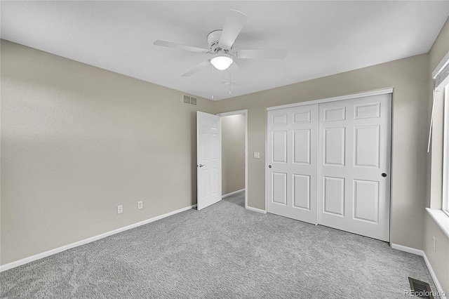 16500 Hitching Post Cir, Parker, CO 80134 - unfurnished bedroom with carpet, a closet, and ceiling fan