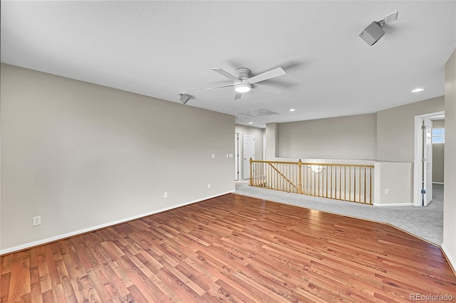 16500 Hitching Post Cir, Parker, CO 80134 - unfurnished room featuring wood finished floors, ceiling fan, and recessed lighting