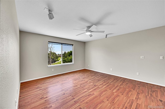 16500 Hitching Post Cir, Parker, CO 80134 - unfurnished room featuring a ceiling fan and wood finished floors