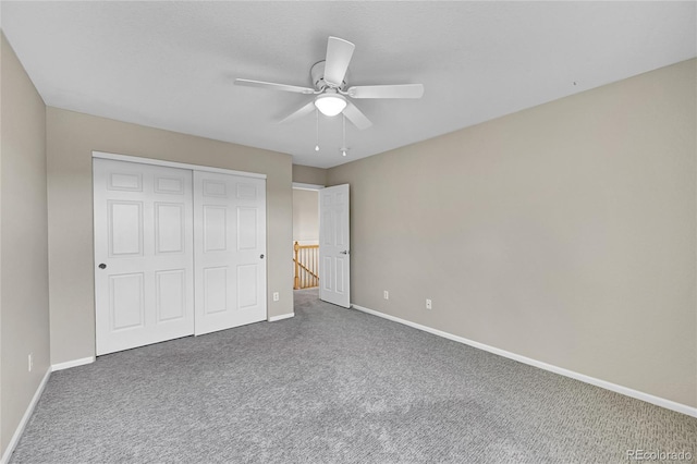 16500 Hitching Post Cir, Parker, CO 80134 - unfurnished bedroom featuring carpet flooring, a closet, and ceiling fan