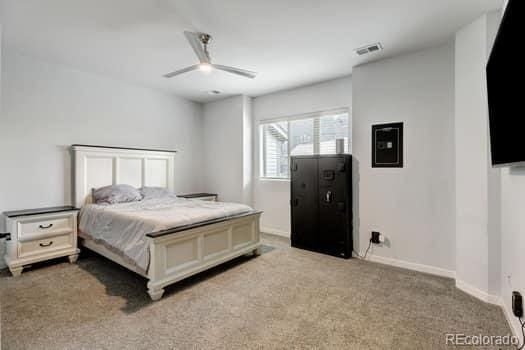 carpeted bedroom featuring ceiling fan