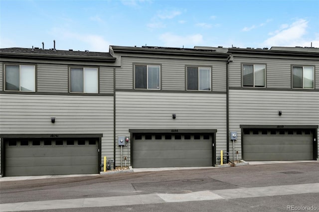 view of property featuring a garage