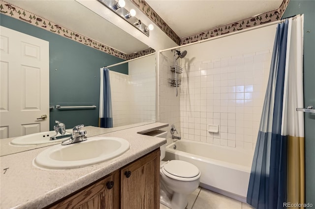 bathroom with tile patterned floors, vanity, toilet, and shower / tub combo