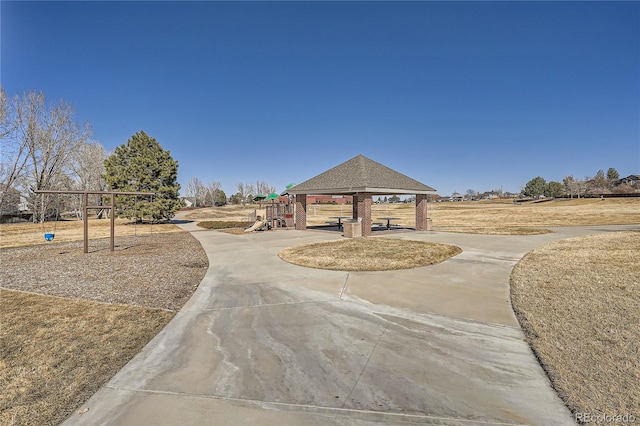 surrounding community featuring a gazebo and playground community