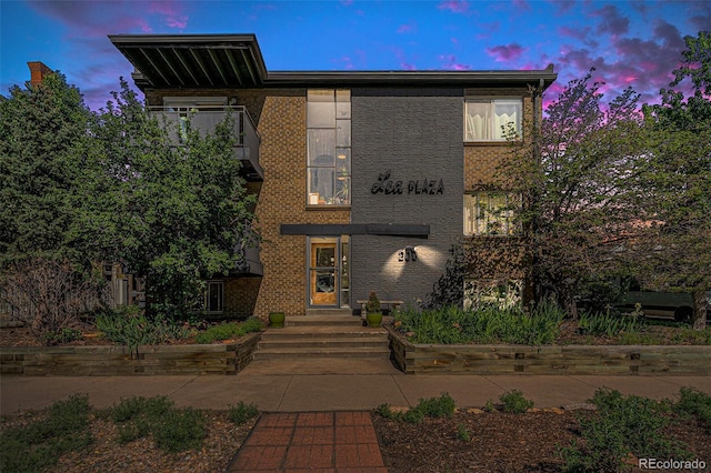 view of front of property with brick siding
