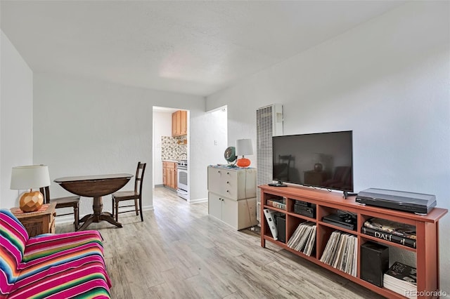 2955 N Gilpin St, Denver, CO 80205 - living room featuring wood finished floors and baseboards