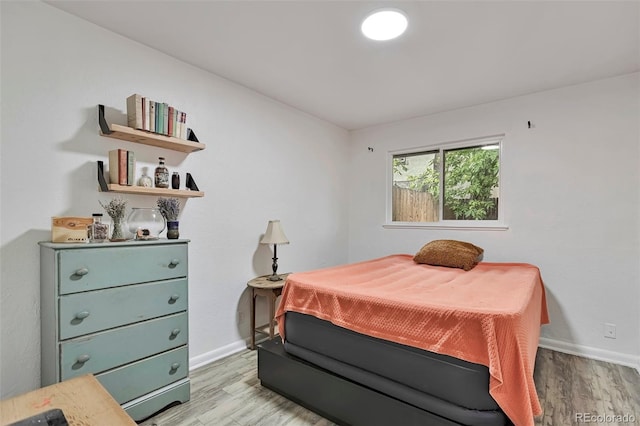 2955 N Gilpin St, Denver, CO 80205 - bedroom featuring light wood-style floors and baseboards
