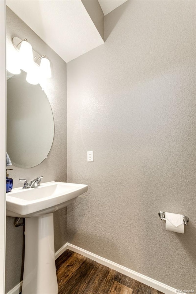 bathroom featuring hardwood / wood-style floors and sink