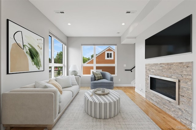 1284 Tennyson St Unit 1, Denver, CO 80204 - living area featuring light wood-style flooring and recessed lighting