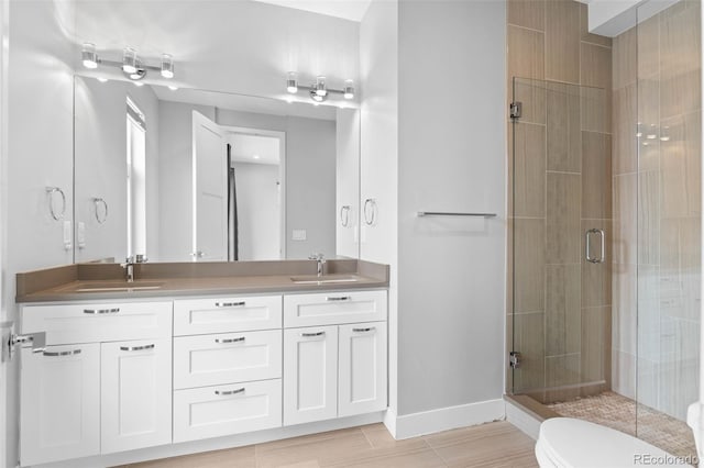 1284 Tennyson St Unit 1, Denver, CO 80204 - full bathroom with a shower stall and double vanity