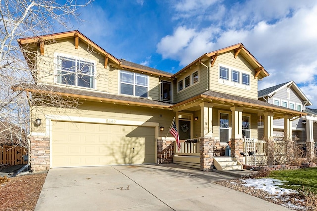 craftsman-style house featuring a garage and a porch