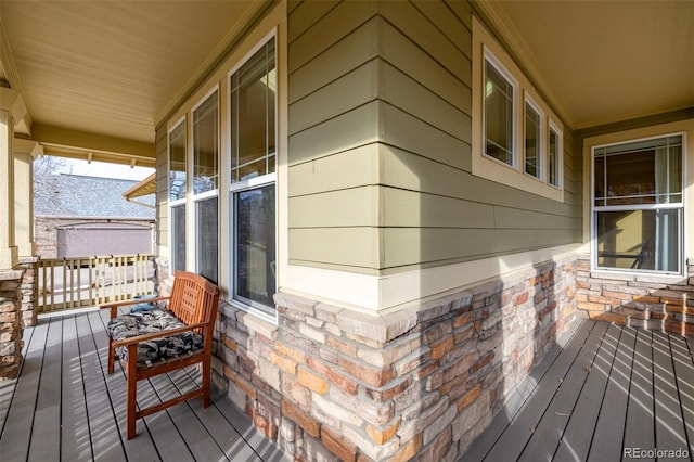 wooden terrace with covered porch