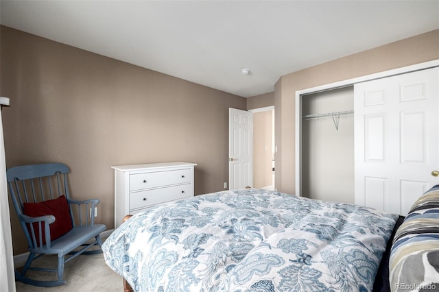 carpeted bedroom with a closet