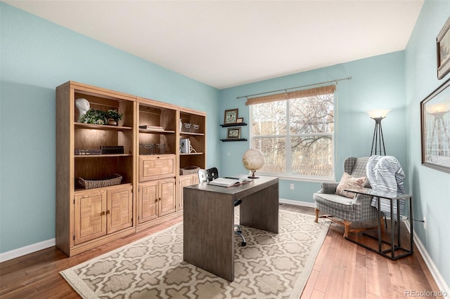 office space with hardwood / wood-style flooring