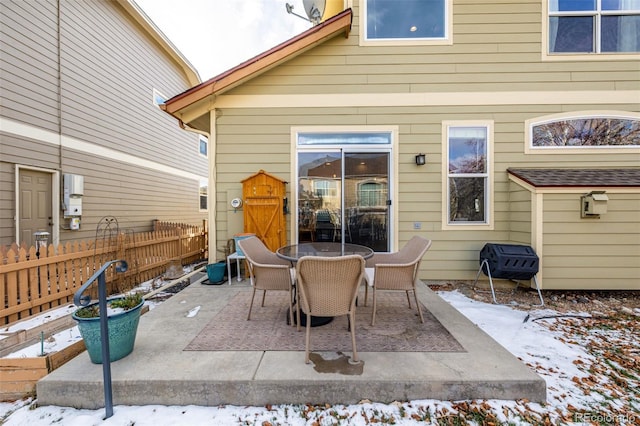 view of snow covered patio