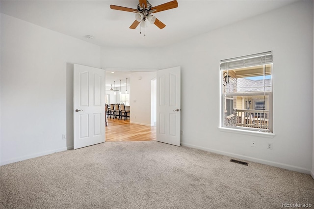 4400 S Ensenada St, Aurora, CO 80015 - unfurnished room with carpet floors, ceiling fan, and baseboards