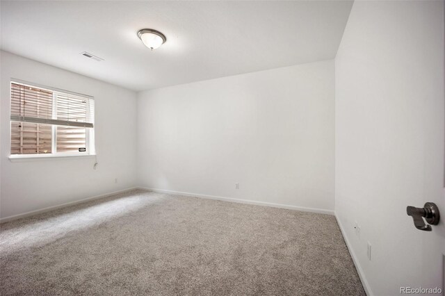 4400 S Ensenada St, Aurora, CO 80015 - carpeted spare room featuring baseboards