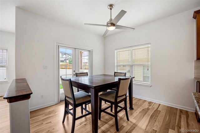 4400 S Ensenada St, Aurora, CO 80015 - dining space featuring light wood-style floors, ceiling fan, baseboards, and french doors