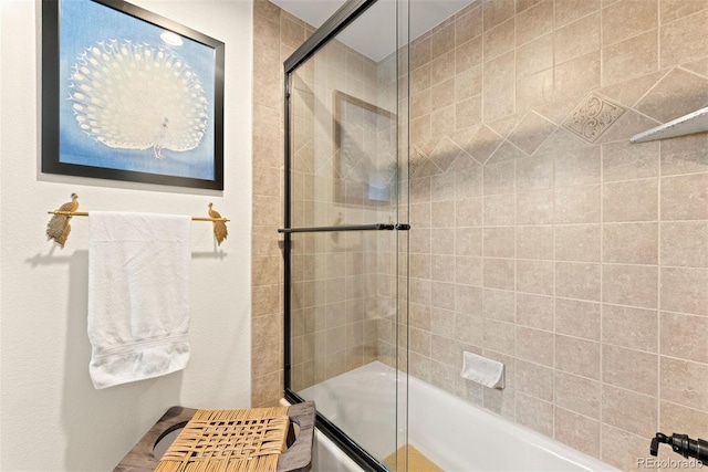 bathroom featuring enclosed tub / shower combo