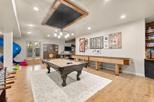 playroom featuring billiards, light hardwood / wood-style flooring, and french doors