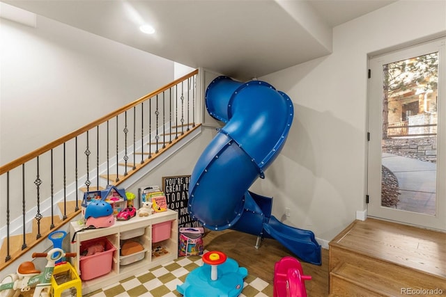 playroom featuring hardwood / wood-style flooring