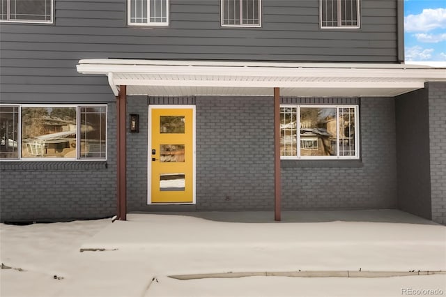 doorway to property featuring a patio