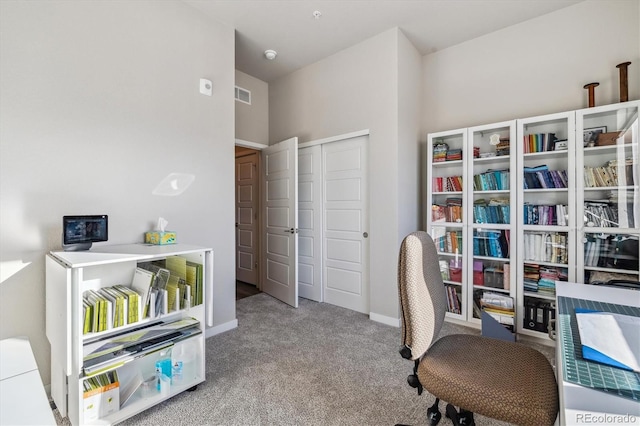 home office featuring visible vents, baseboards, and carpet flooring