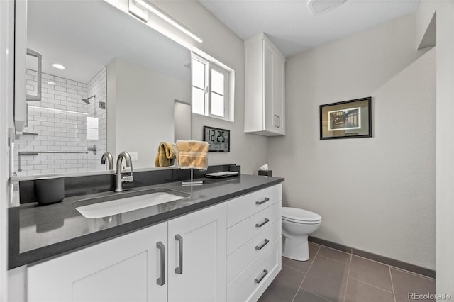 2528 Concord Cir, Lafayette, CO 80026 - full bath featuring vanity, a tile shower, and tile patterned flooring