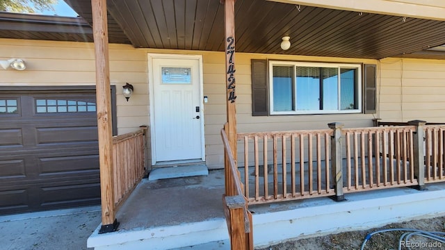 entrance to property featuring a garage