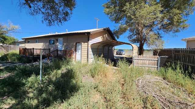 view of home's exterior with a deck