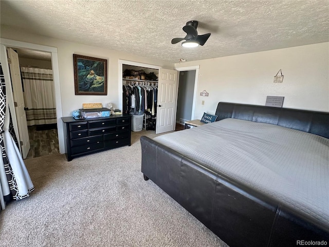 98 Baylor Dr, Buena Vista, CO 81211 - bedroom featuring a closet, carpet flooring, a textured ceiling, ceiling fan, and connected bathroom