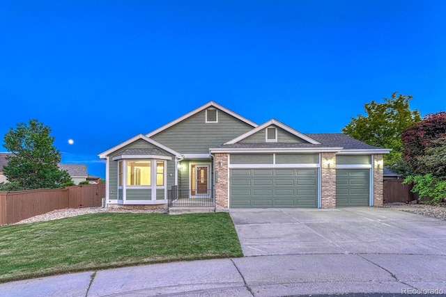 1838 Mountain Daisy Ct, Highlands Ranch, CO 80129 - view of front of home featuring an attached garage, driveway, and brick siding