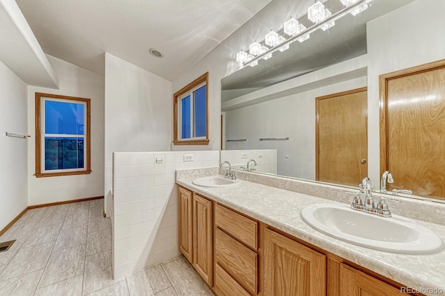 1838 Mountain Daisy Ct, Highlands Ranch, CO 80129 - bathroom featuring double vanity and tile patterned floors