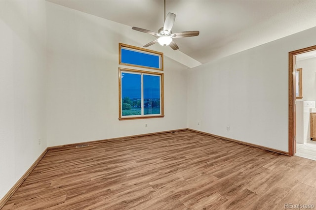 1838 Mountain Daisy Ct, Highlands Ranch, CO 80129 - spare room featuring light wood-type flooring, a ceiling fan, and lofted ceiling