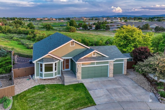 1838 Mountain Daisy Ct, Highlands Ranch, CO 80129 - single story home featuring an attached garage, concrete driveway, roof with shingles, and brick siding