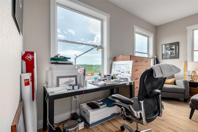 19500 Wedemeyer Rd, Kiowa, CO 80117 - office space featuring plenty of natural light and wood finished floors