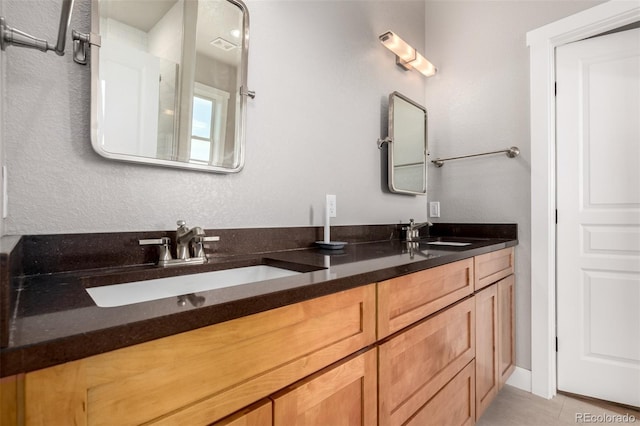 19500 Wedemeyer Rd, Kiowa, CO 80117 - full bath featuring double vanity and tile patterned flooring