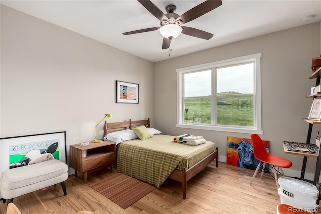 19500 Wedemeyer Rd, Kiowa, CO 80117 - bedroom featuring light wood-style flooring and a ceiling fan