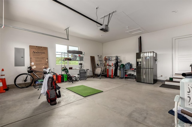 19500 Wedemeyer Rd, Kiowa, CO 80117 - garage with stainless steel refrigerator with ice dispenser, a garage door opener, and electric panel