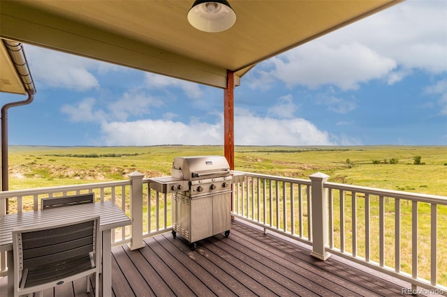 19500 Wedemeyer Rd, Kiowa, CO 80117 - wooden deck with area for grilling and a rural view