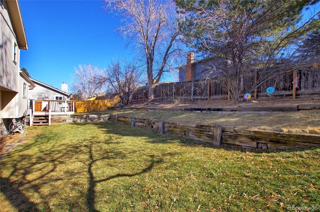 view of yard with a deck