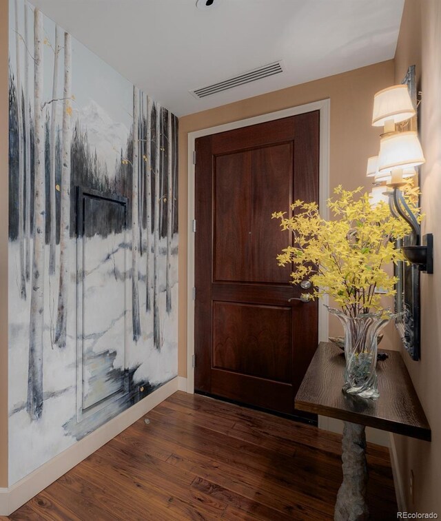 entrance foyer with dark hardwood / wood-style floors