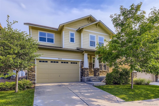 3514 E 141st Dr, Thornton, CO 80602 - craftsman inspired home featuring an attached garage, stone siding, driveway, and a front lawn